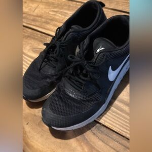 Nike Black Mesh Sneakers with White Accents